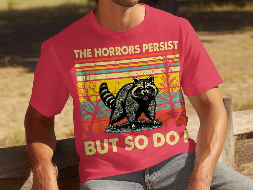 The Horrors Persist But So Do I Raccoon Graphic T-Shirts product image 1
