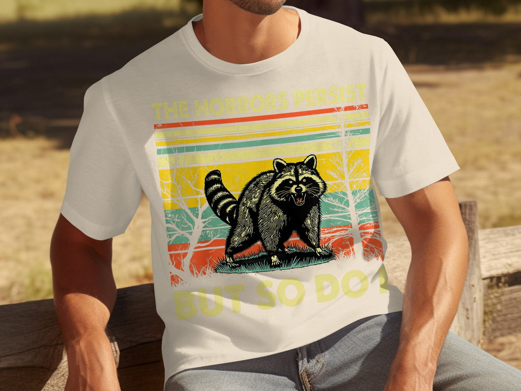 The Horrors Persist But So Do I Raccoon Graphic T-Shirts product image 7