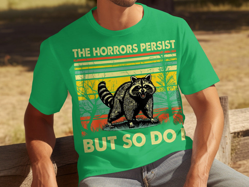 The Horrors Persist But So Do I Raccoon Graphic T-Shirts product image 5